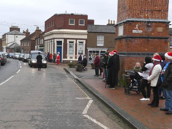 Members of the community lined the streets to pay tribute to their Santa, Wally' Ernest Parnham, who died last month.