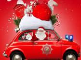 Sleaford firefighters' drive through Santa's Grotto. EMN-201214-112242001