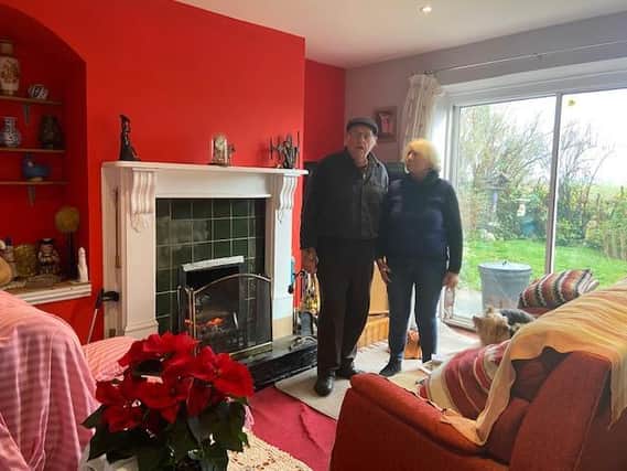 Derek and June Driver - back in their home for Christmas after spending it in a caravan last year.