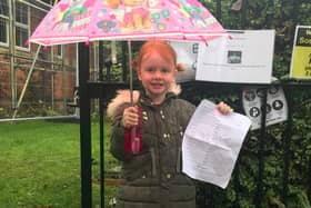 Caythorpe primary school pupil Isla Armitage, 5, starts the Christmas treasure hunt at the school.
