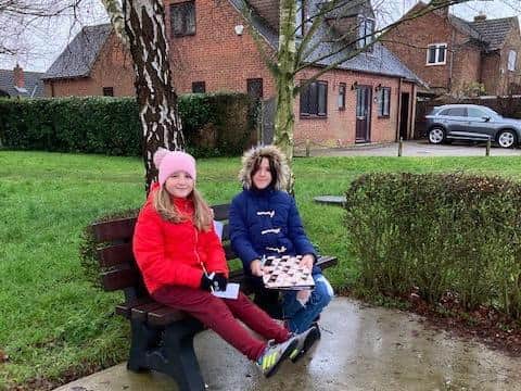Families taking part in Caythorpe primary school's Christmas treasure hunt.