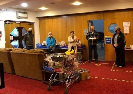 Pam Ashley-Marsh, President of Rotary Club of Louth, presented Greg Gilbert  and volunteers with £500 in Aldi vouchers for the Community Larder at the Trinity Centre.