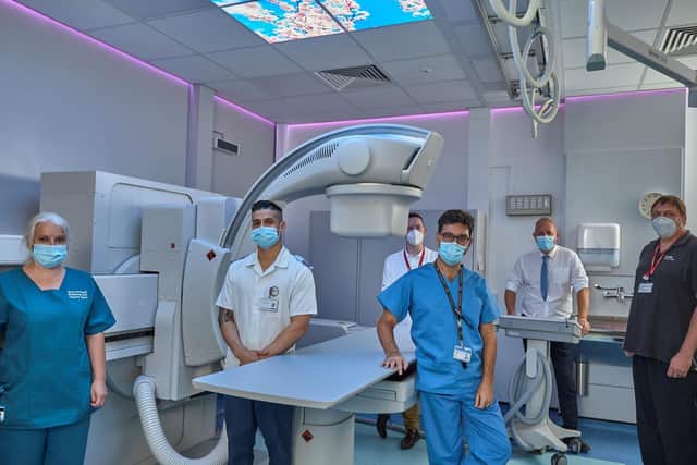 Pictured are Deputy Sister Interventional Radiology Kelly Kear, Senior Radiographer Cesar Herrera, Canon Medical Systems Applications Specialist Andrew Mayes, Consultant Interventional Radiologist Dr Emmanouil Blevrakis, Radiology Operations Manager Nigel Allen and Canon Medical Systems Service Engineer Peter Oberholzer in the fluoroscopy suite at Pilgrim hospita