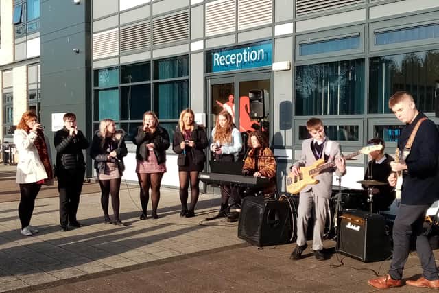 The St George's Academy sixth form musicians performing musical handwashing at Sleaford campus. EMN-201219-154631001