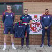 Members of the Horncastle Town management team show off this season's managers' kit, sponsored by Shinn Developments.