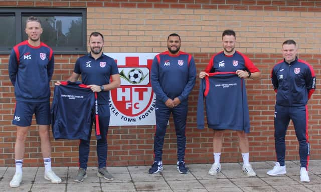 Members of the Horncastle Town management team show off this season's managers' kit, sponsored by Shinn Developments.