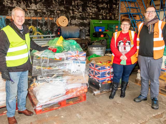 The Rev Stephen Holland with Louise White and Dave Burton-White.