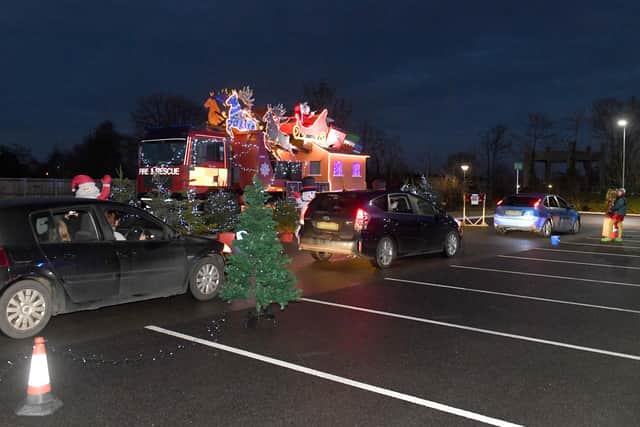 Santa's drive-through grotto at Sleaford fire station, for Firefighters Charity. EMN-201217-180112001