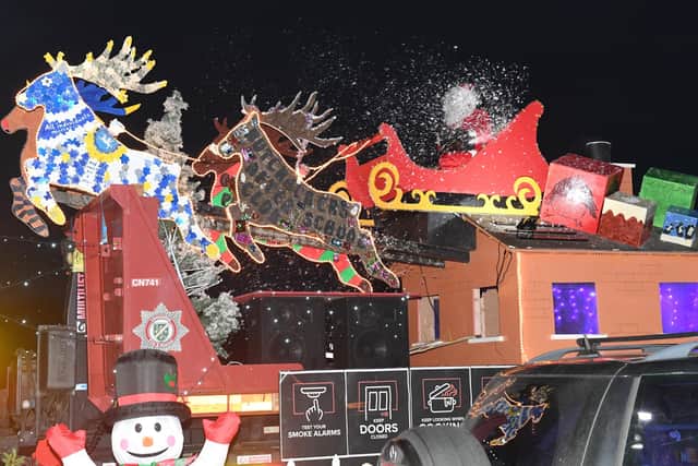 Santa's drive-through grotto at Sleaford fire station, for Firefighters Charity. EMN-201217-180146001