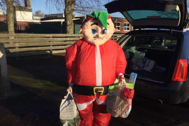 Delivering shopping bags filled with Christmas goodies