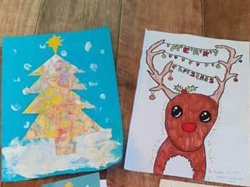 The winning Christmas cards - on the left is Ben’s and Liberty’s is on the right.