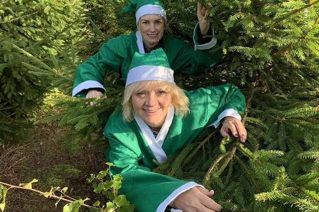 Caroline Swindin and Louise Cotton from the Hospice. EMN-201218-181153001