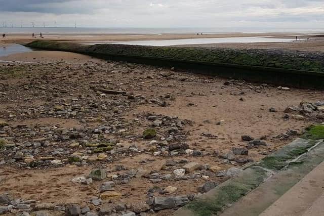 The Environment Agency was forced to do more work along the coast after late Spring tides left deep gullies on the beach and left it covered in rubble.