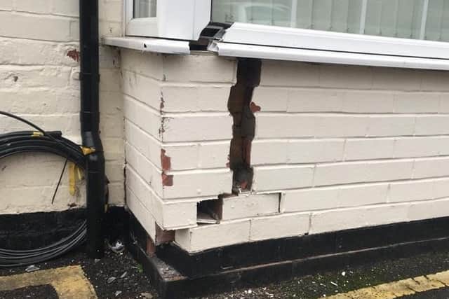 Cracked. Damage done to Dr Caroline Johnson's office by the collision. EMN-201221-110032001