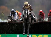 MARKET RASEN, ENGLAND - DECEMBER 03: Zakety Zak ridden by Sean Quinlan (centre) clears a fence during the Watch & Bet At MansionBet Handicap Chase at Market Rasen Racecourse on December 3, 2020 in Market Rasen, England. (Photo by Mike Egerton - Pool/Getty Images) 775593760