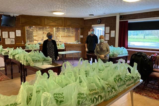 Some of the volunteers who put the packages together