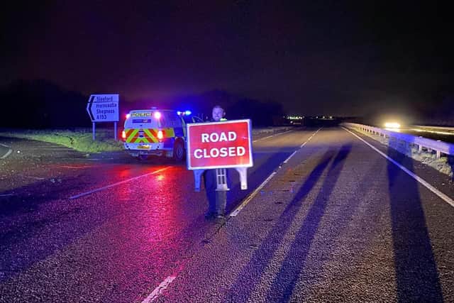 The A17 closed due to flooding overnight around Sleaford. Photo: Lincs Police Specials. EMN-201224-081638001