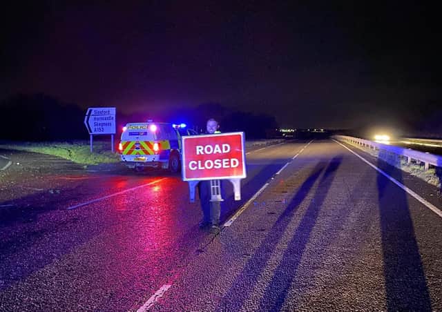 The A17 closed due to flooding overnight around Sleaford. Photo: Lincs Police Specials. EMN-201224-081638001