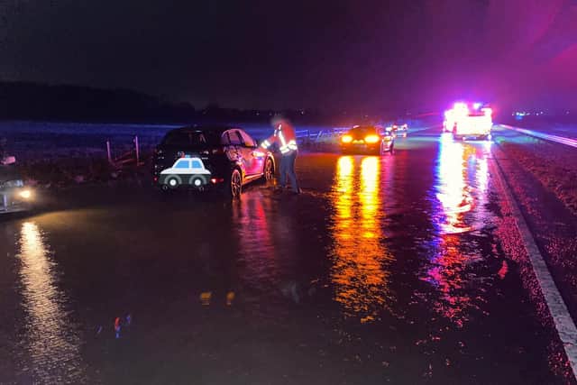 Motorists were warned to avoid the area after localised flooding on the A17 Sleaford bypass blocked the road eastbound. Photo: Lincs Police Specials EMN-201224-081649001