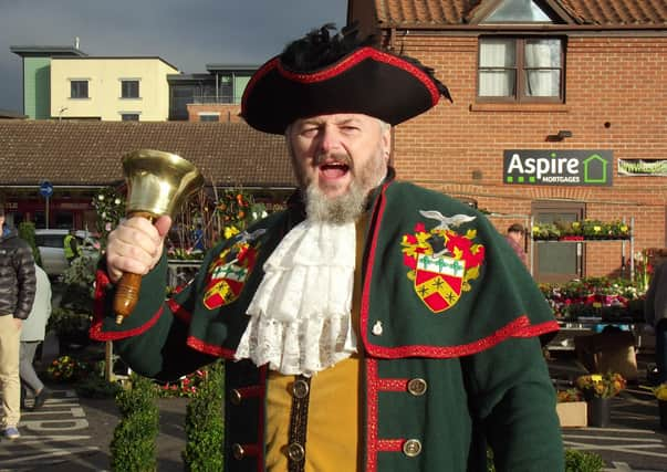 Sleaford Town Crier John Griffiths will be ringing a bell for Santa. EMN-201224-123555001