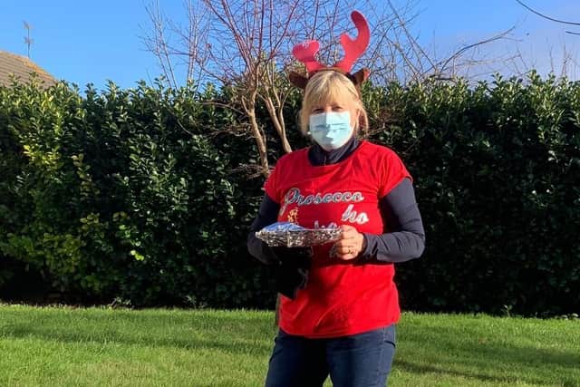 Coun Sarah Trotter delivering Christmas meals. EMN-201224-130534001