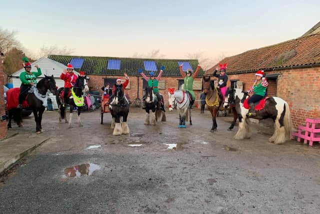 A procession of horse riding Santas around Wainfleet is to become an annual event. Photo: Monroe Photography
