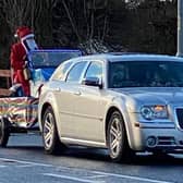 Santa distributing sweets in Skegness on Christmas Day.