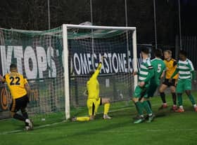Joe Leesley powers home. Photo: Oliver Atkin.