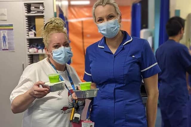 Nurses receive their meals with thanks