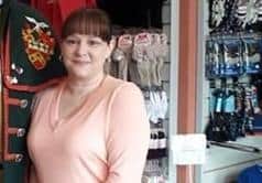 Anxious about the future - Lorraine Buckley of Lorraine's Childrenswear, pictured in happier times when she opened her shop two years ago. EMN-201230-172125001
