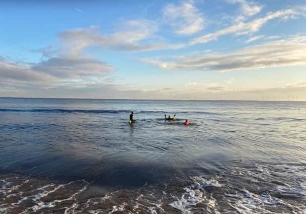 Members of Skegness Tri Club taking the plunge in Skegness on New Year's Day.