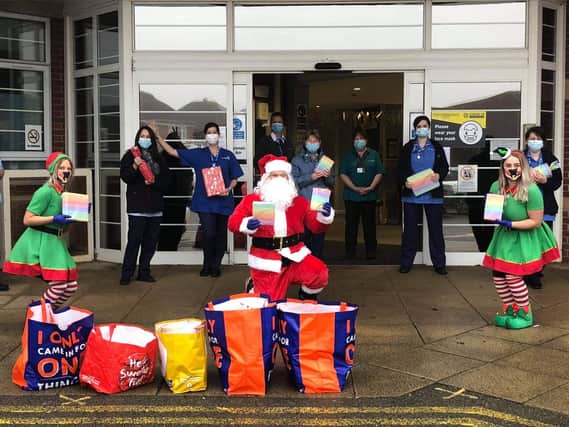 Phoenix Fitness members delivering gifts to frontline workers over the festive period.