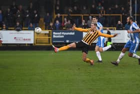 Jake Wright scores against Kettering last season.
