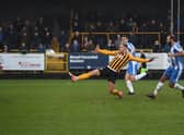 Jake Wright scores against Kettering last season.