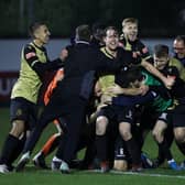 Marine players celebrate winning the match after the final whistle during the Emirates FA Cup Second Round contest against Havant and Waterloovile. Photo: Getty Images