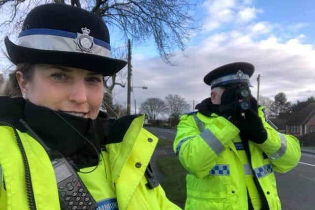 Sleaford neighbourhood policing team officers out checking the speed of motorists in Billinghay. EMN-210401-183553001