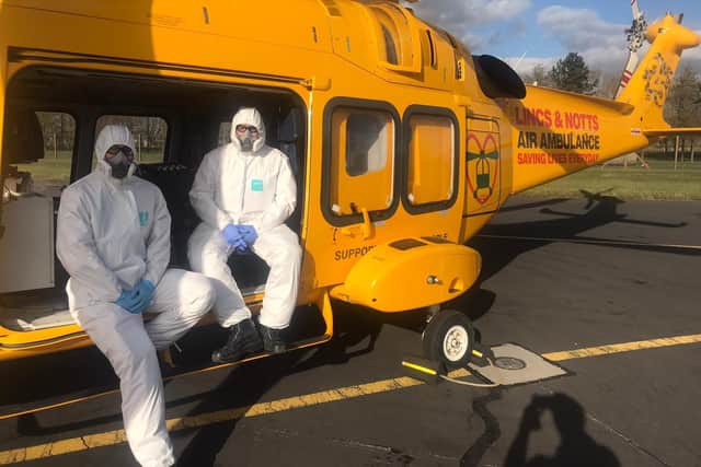 Lincs and Notts Air Ambulance paramedics in PPE.