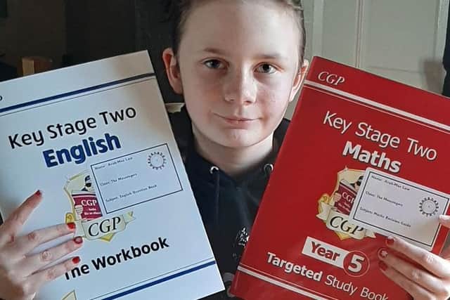 Avah-Mae Law of Wainfleet Magdalen School preparing for home schooling.