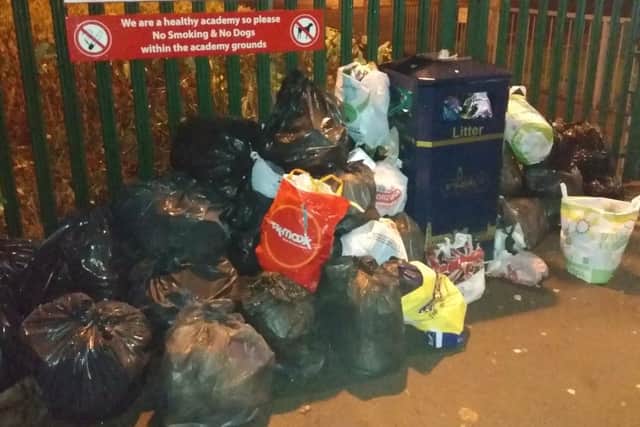 The rubbish left outside the school