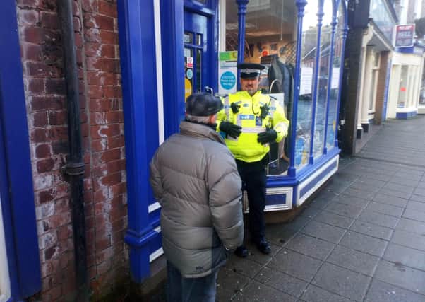 On patrol: PCSO Wass chats to a resident in Horncastle’s High Street