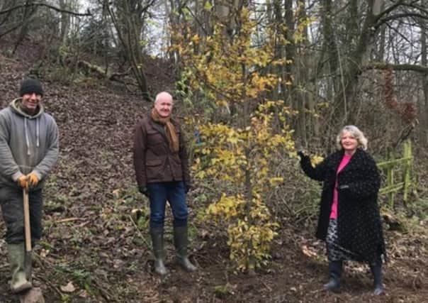 Hubbard’s Hills Trust Chairman Andrew Leonard (centre) takes stock of the new planting with Trust secretary Jill Makinson-Sanders and Contractor Michael Payne. EMN-210801-160752001