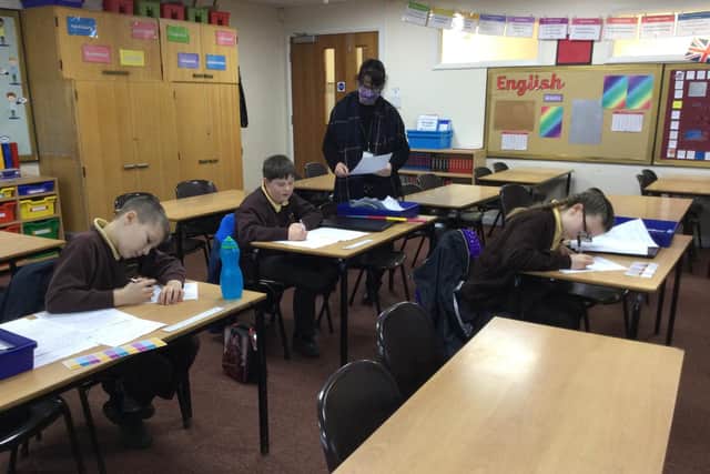 Miss Abi Johnsons Year 6 class.at the Richmond School in Skegness. Key worker pupilsare pictured with with Teaching Assistant Mrs Anna Bradbrook.