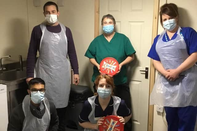 The vaccination team which visited Ashdene care home, receiving their gifts of chocolates. EMN-210901-181845001