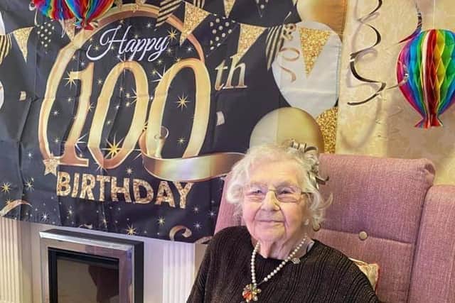 Sheila Knott celebrating her centenary. EMN-210901-191435001