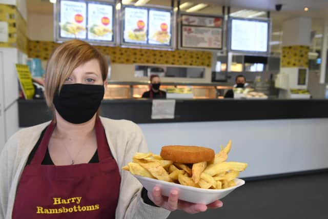 Amy Tetther with a delicious tray of fish and chips.