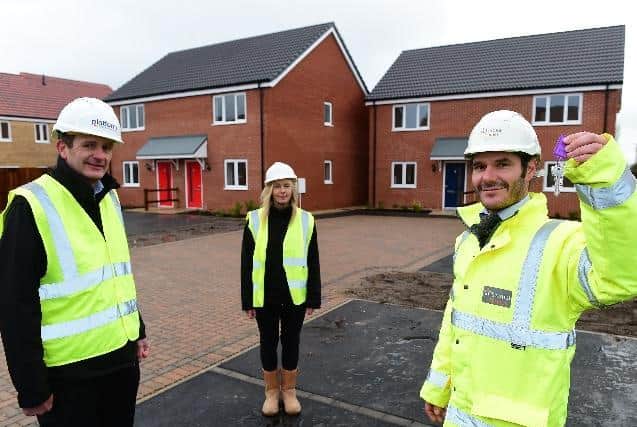 Pictured (from left) are Andy Parker, Area development manager at Platform housing, with Zoe Brown, Project Manager from Platform Housing and Luke Forsyth Assistant Site Manager at Chestnut Homes.