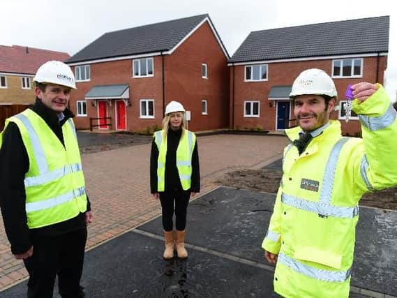 Pictured (from left) are Andy Parker, Area development manager at Platform housing, with Zoe Brown, Project Manager from Platform Housing and Luke Forsyth Assistant Site Manager at Chestnut Homes.