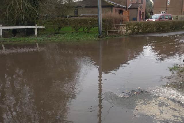 Flooding on Washdyke Lane, which residents say is caused by a blocked drain