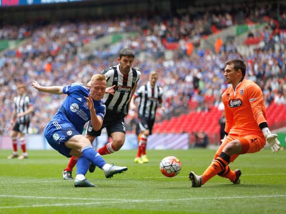 Jordan Burrow is denied by Grimsby's James McKeown in the 2016 FA Trophy final. Photo: GettyImages