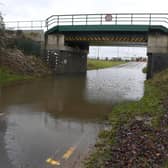 Flood water under the railway bridge on Boston Road, Sleaford. EMN-210120-174633001